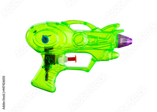 futuristic green water gun toy isolated on white background