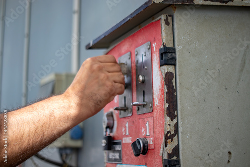 close up of hand holding pump