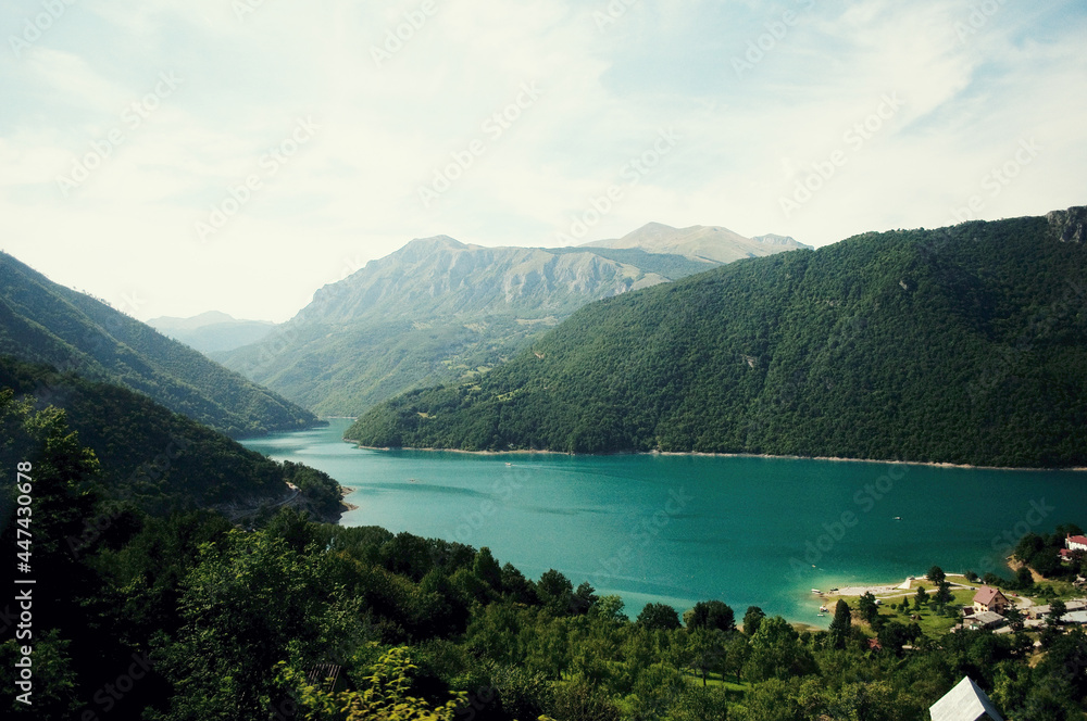 MONTENEGRO: Scenic landscape view of the fjord with mountains and blue water 