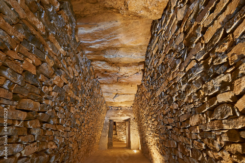 interior of the Dolmen del Romeral (tholos El Romeral) megalithic monument, declared a World Heritage Site by UNESCO in Antequera, Malaga. Spain