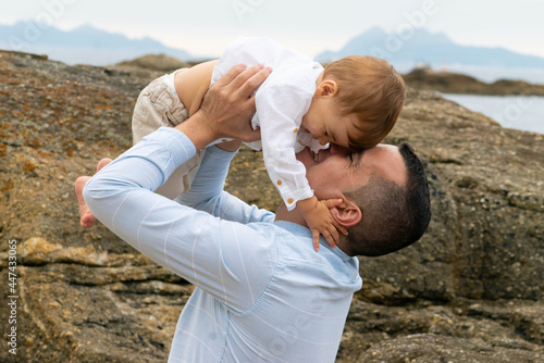 father and child on beach