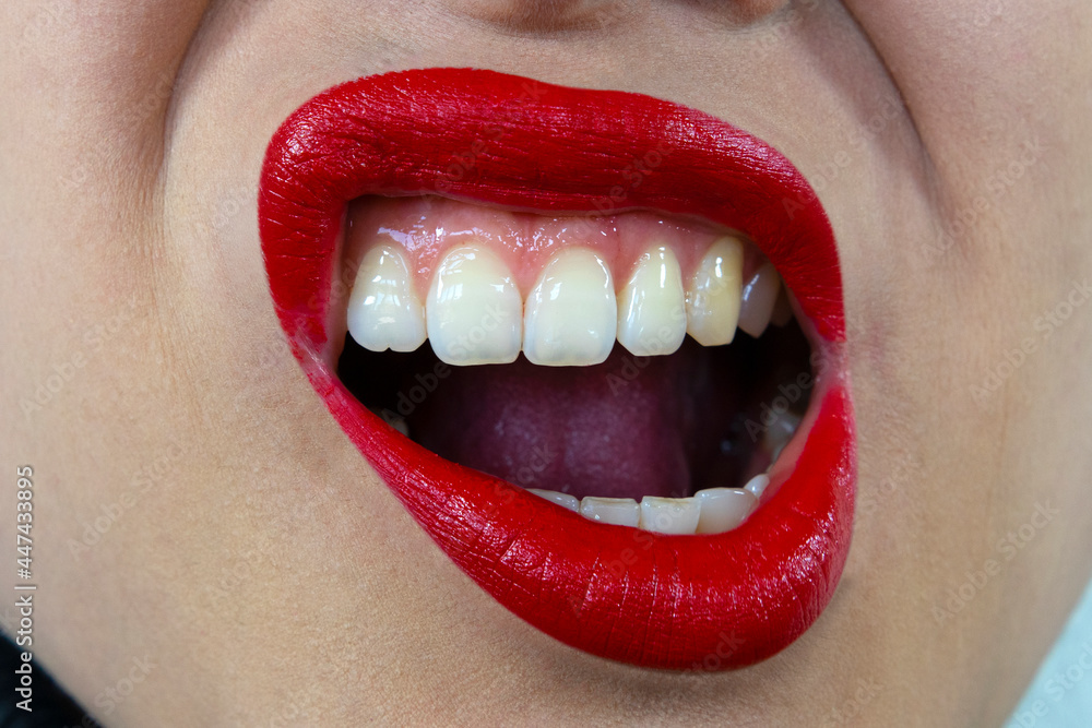 Foto Stock Sexy, sensual mouth with red lipstick and white teeth | Adobe  Stock