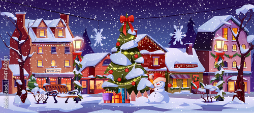 Christmas landscape at night, street decorations, decorated houses, Xmas tree, snowman and lanterns, snowflakes and starry dark sky. Light in houses with chimneys, snow on bench, gift boxes, shop