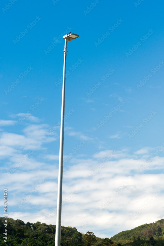lamp post electricity industry ,street light against the blue sky. lamp post electricity industry ,street light against the blue sky.