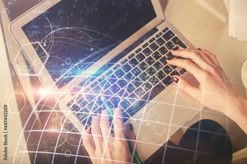 Double exposure of woman hands working on computer and world map hologram drawing. Top View. International business concept. Double exposure of woman hands working on computer and world map hologram drawing. Top View. International business concept.
