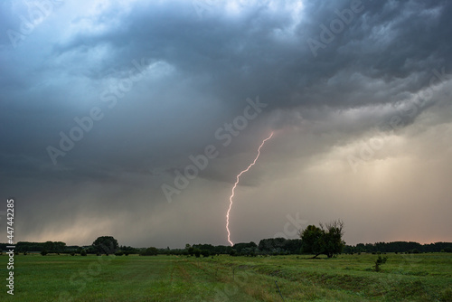 Lightning bolt strikes down on the plains