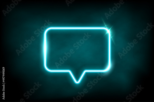 Glowing azure neon speech bubble sign. Electric light rectangle frame isolated on dark background with fog. Vector design element.