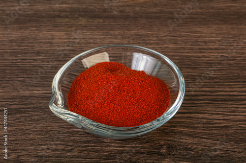 Dry paprika powder in the bowl