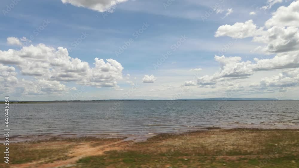 Move the camera Aerial drone shot panoramic view, waterfront in the dam clear sky mountain lake background beautiful natural.
Move the camera Aerial drone shot panoramic view, waterfront in the dam clear sky mountain lake background beautiful natural.
