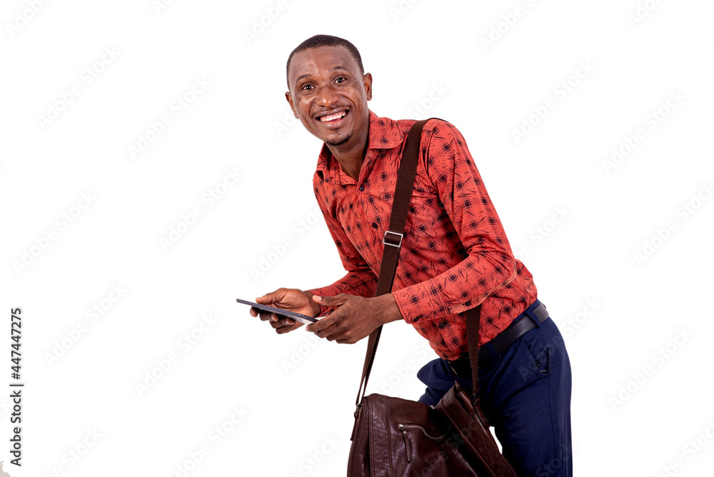 young business man holding on a digital tablet smiling. young business man holding on a digital tablet smiling.