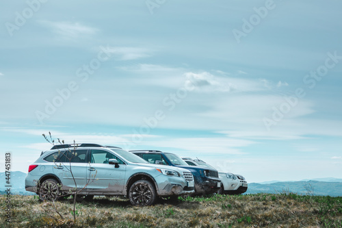 three suv cars at mountains peak © phpetrunina14