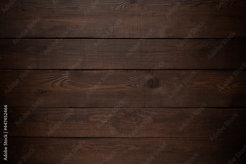Wooden dark background texture with vignetting. Wooden dark background texture with vignetting.