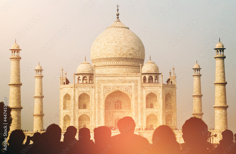 View of Taj Mahal with tourist silhouettes