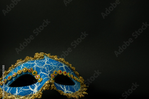  Carnival mask on black background
