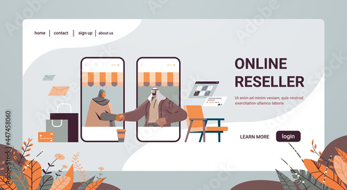 arab businesspeople shaking hands business partners on smartphones screen making deal agreement handshake partnership