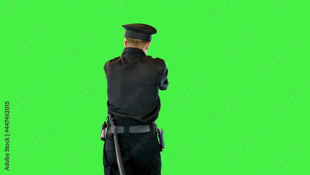 Caucasian policeman runs, gets the gun out and aims on a Green Screen, Chroma Key. Caucasian policeman runs, gets the gun out and aims on a Green Screen, Chroma Key.