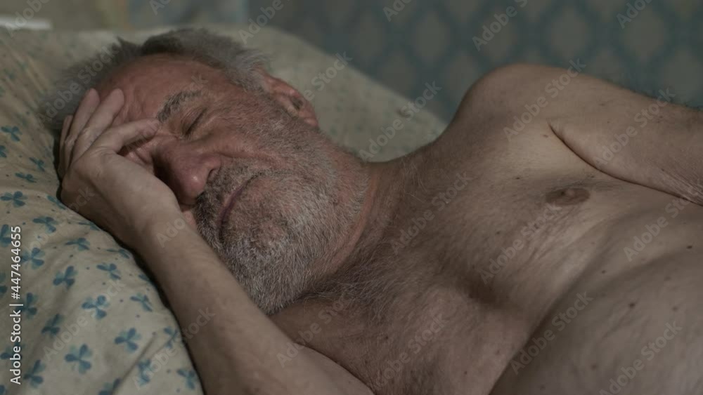 Senior poor man sleeping at home Senior poor man sleeping at home