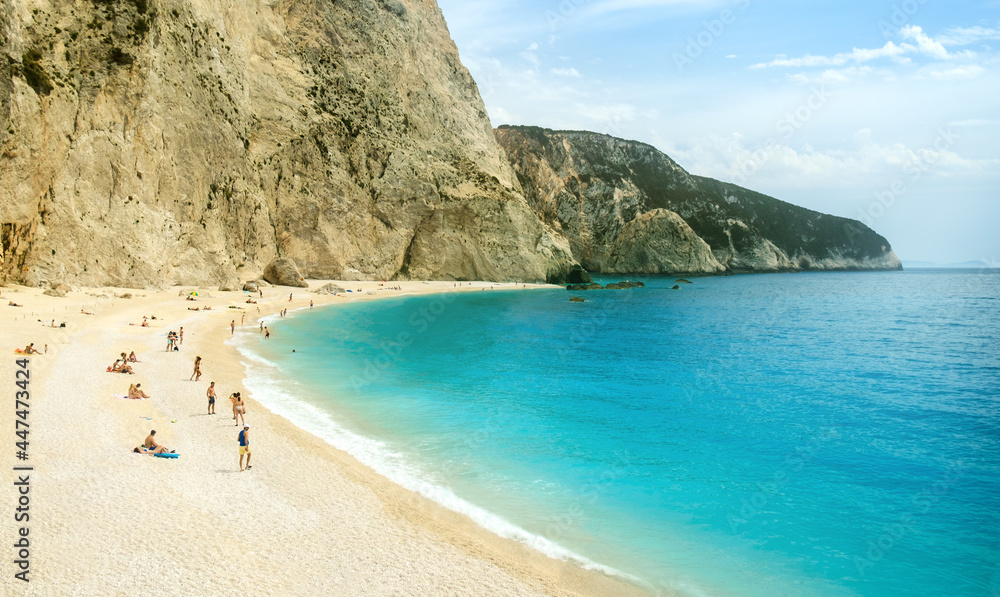 Porto Katsiki beach with people at summer day. Summer holidays in Greece. Porto Katsiki beach with people at summer day. Summer holidays in Greece.