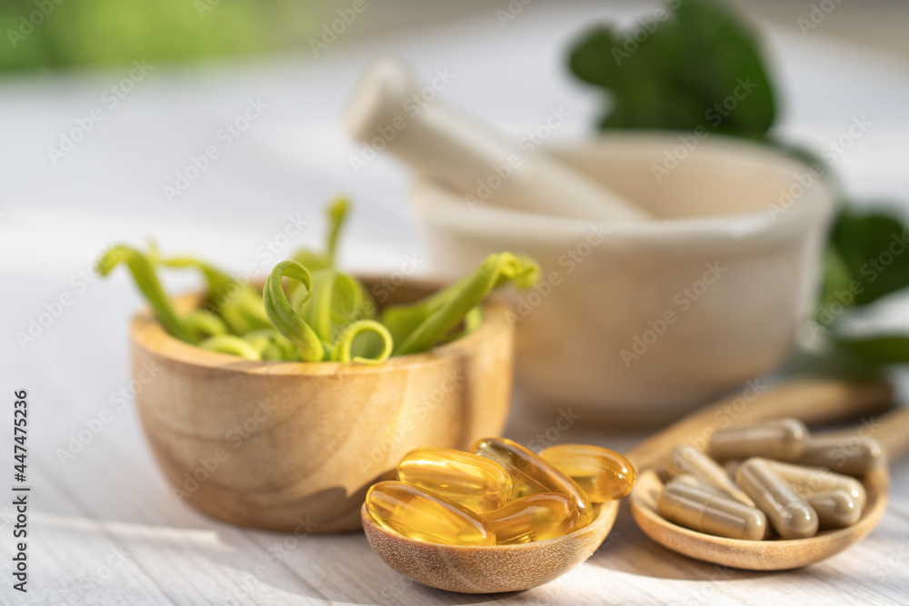 Alternative medicine herbal organic capsule with vitamin E omega 3 fish oil, mineral, drug with herbs leaf natural supplements for healthy good life. Alternative medicine herbal organic capsule with vitamin E omega 3 fish oil, mineral, drug with herbs leaf natural supplements for healthy good life.