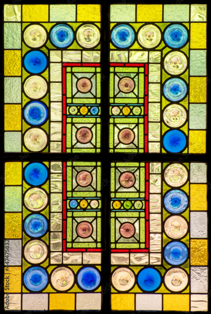 Stained glass door panel full of beautiful colours.