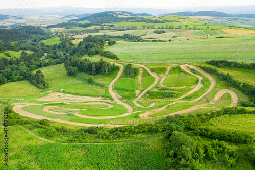 Top view of curvy and windy road in countryside. 
