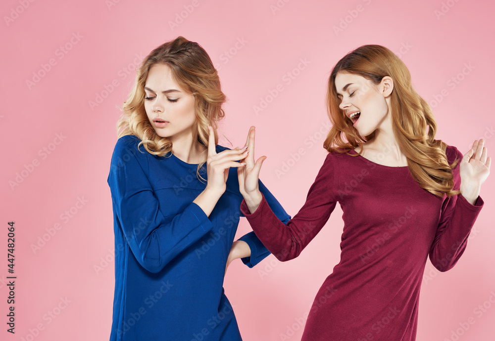 woman holding hair girlfriend in dresses fun friendship woman holding hair girlfriend in dresses fun friendship