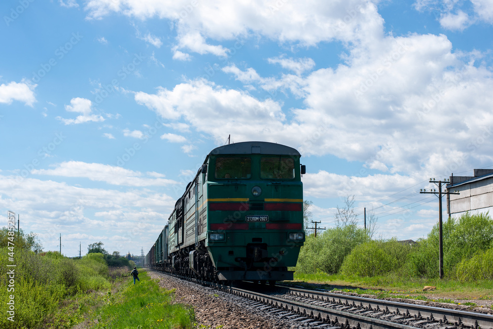 YAMNYTSYA, UKRAINE - May 09, 2021. Locomotive 2TE10M-2821 in the Ivano-Frankivsk oblast. YAMNYTSYA, UKRAINE - May 09, 2021. Locomotive 2TE10M-2821 in the Ivano-Frankivsk oblast.