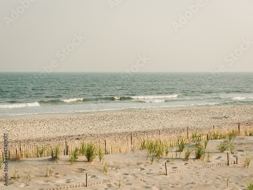 Sand dunes and view of waves in the Atlantic Ocean  at Fire Island  New York