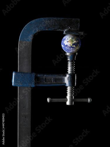heart squeezed by a vise