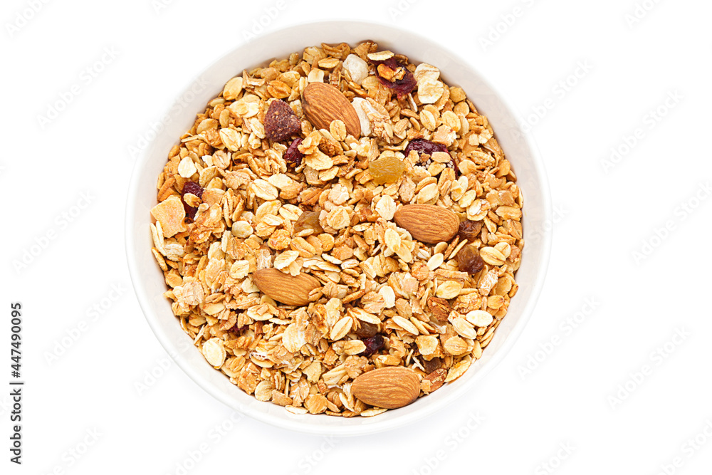 Tasty granola in bowl on white background Tasty granola in bowl on white background