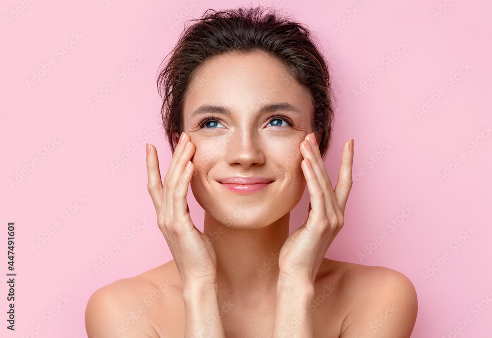 Beautiful woman with perfect skin on pink background. Beauty and skin care concept Beautiful woman with perfect skin on pink background. Beauty and skin care concept