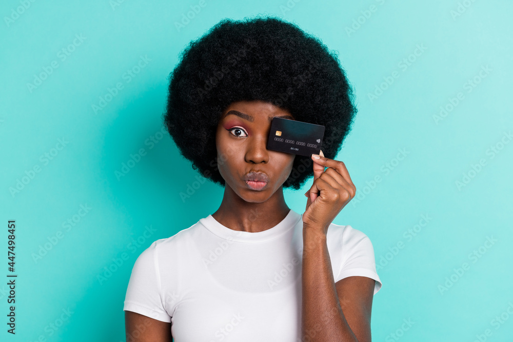 Photo of cute short hairdo young lady card cover eye blow kiss wear white t-shirt isolated on cyan color background Photo of cute short hairdo young lady card cover eye blow kiss wear white t-shirt isolated on cyan color background