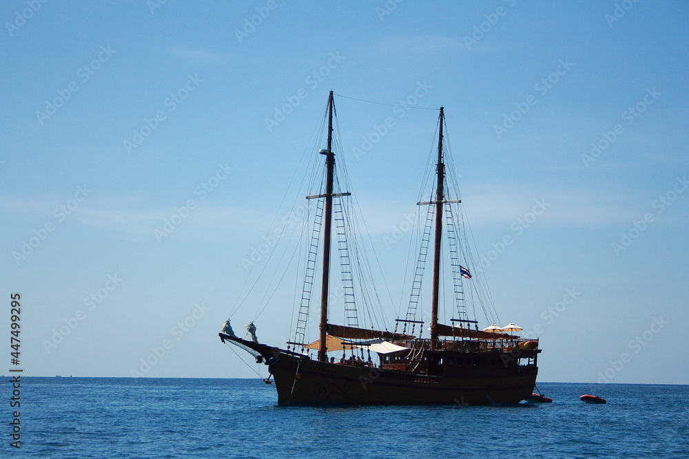 Boat in the sea with blue sky background