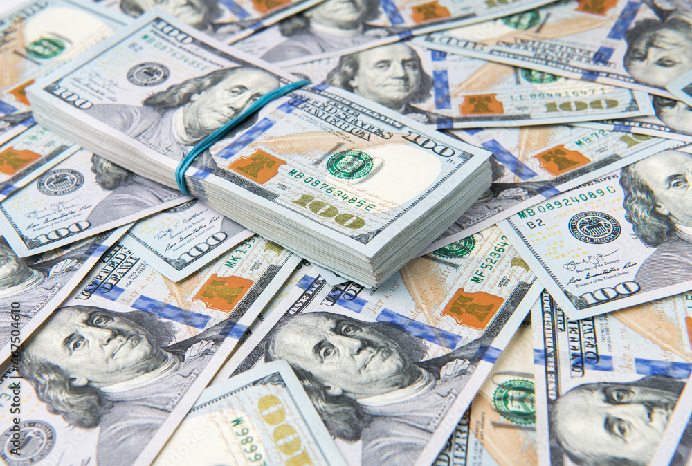 Stack of one hundred dollar bills close-up. Stack of one hundred dollar bills close-up.