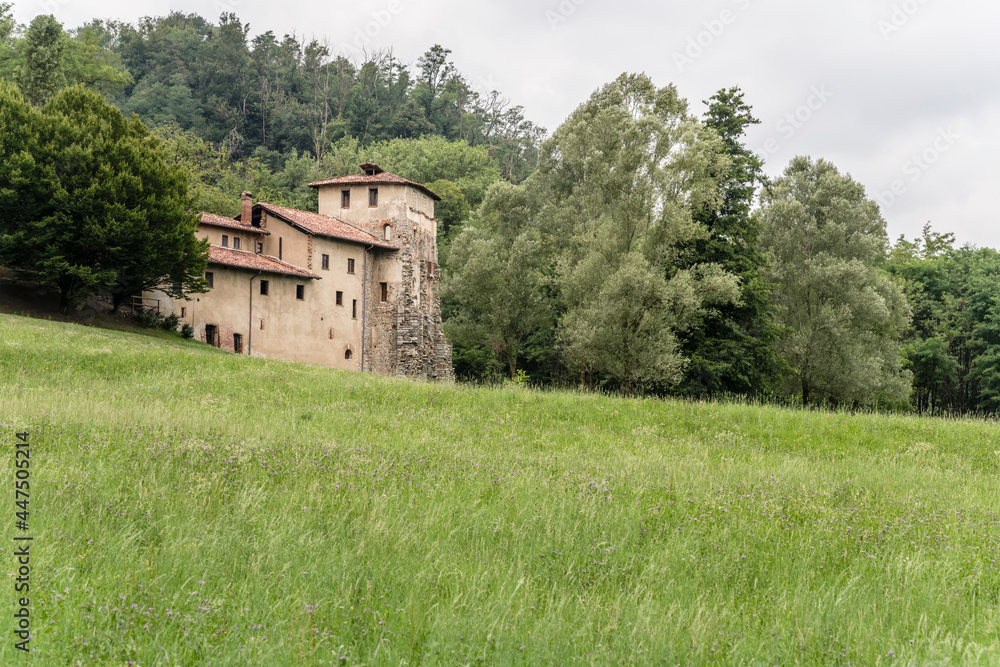 medieval monastery in Olona valley green countryside, Torba, Gornate Olona, Italy