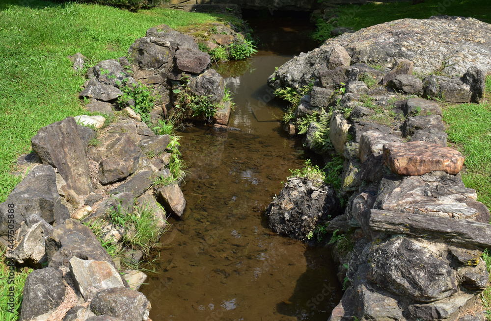 Landscaped, Rock-lined Water Runoff Stream Landscaped, Rock-lined Water Runoff Stream