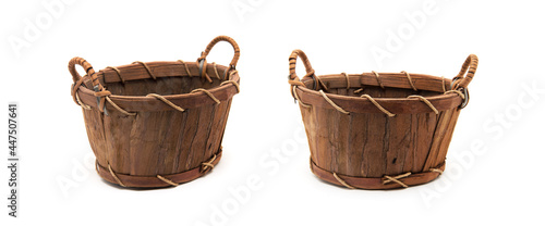 Wooden wattled basket on white background