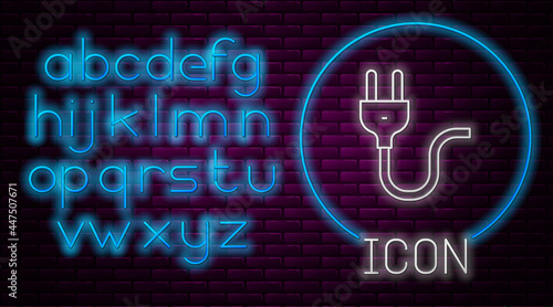 Glowing neon line Electric plug icon isolated on brick wall background. Concept of connection and disconnection of the electricity. Neon light alphabet. Vector