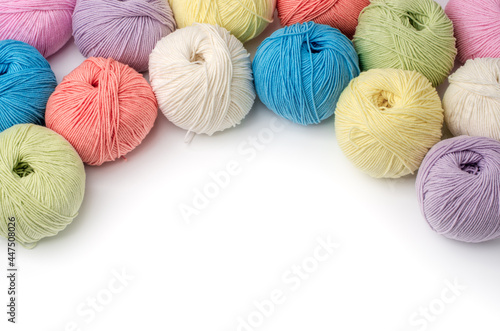 Colorful yarn balls isolated on white