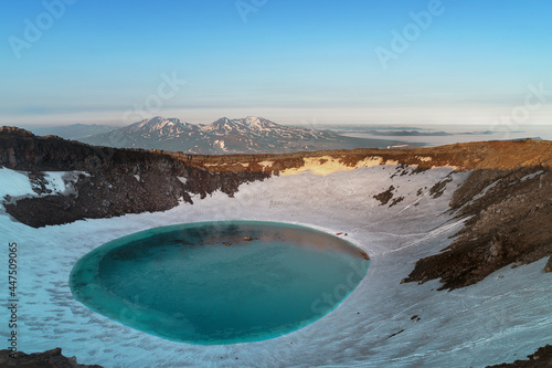 Kamchatka, Russia. A lake in the crater of the Mutnovsky volcano. photo