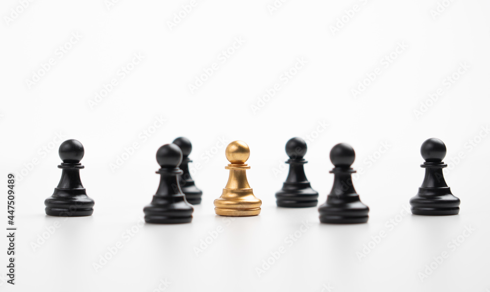 Golden chess pawn standing with the team to show influence and empowerment. Concept of business leadership for leader team, successful competition winner and Leader with influence Golden chess pawn standing with the team to show influence and empowerment. Concept of business leadership for leader team, successful competition winner and Leader with influence