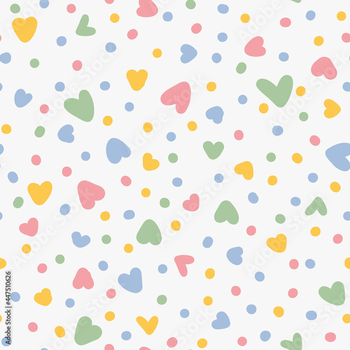 Cute hearts and dots seamless repeat pattern. Random placed and colorful, vector love and geometrical elements all over surface print on white background.