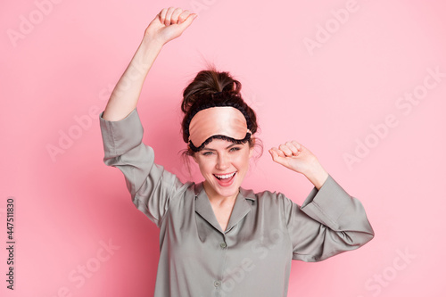 Photo of young girl happy positive smile have fun dance music party wear pajamas isolated over pink color background