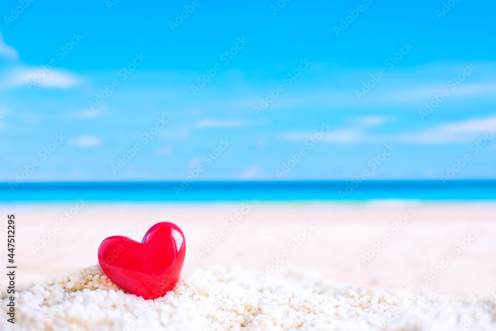 red heart shape on white sand beach
red heart shape on white sand beach