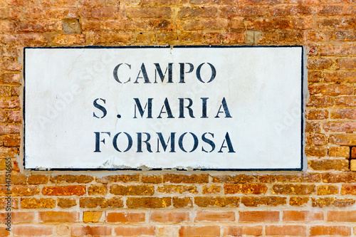 signage campo S. Maria Formosa - engl: square of holy adorable Mary - in Venice at an old grunge house wall. Campo Santa Maria Formosa is a city square in Venice, Italy