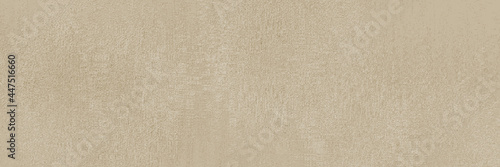 Beige abstract panoramic background, plaster texture.