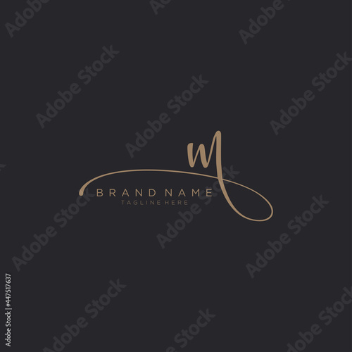 letter M gold handwritten logo vector design template. Black background.