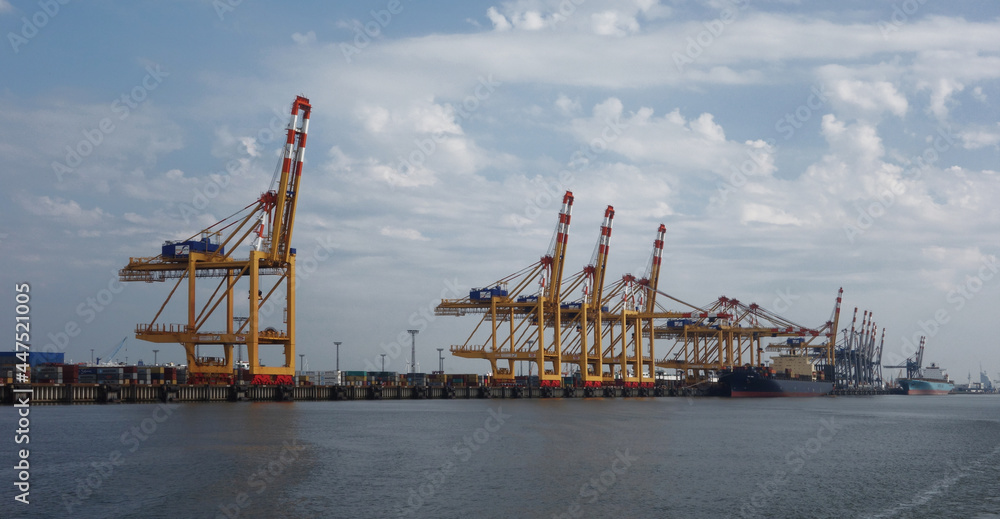 lined cranes in the harbor, view from the sea, Bremerhaven, Germany