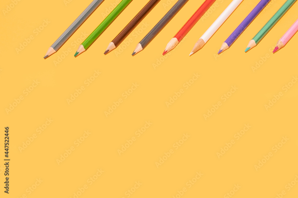Colored school pencils in studio background with copyspace Colored school pencils in studio background with copyspace