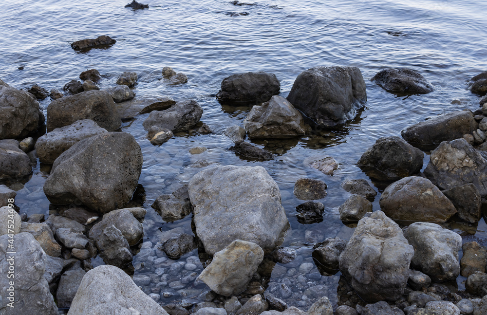 large stones that fell off from the mountains and fell into the sea large stones that fell off from the mountains and fell into the sea